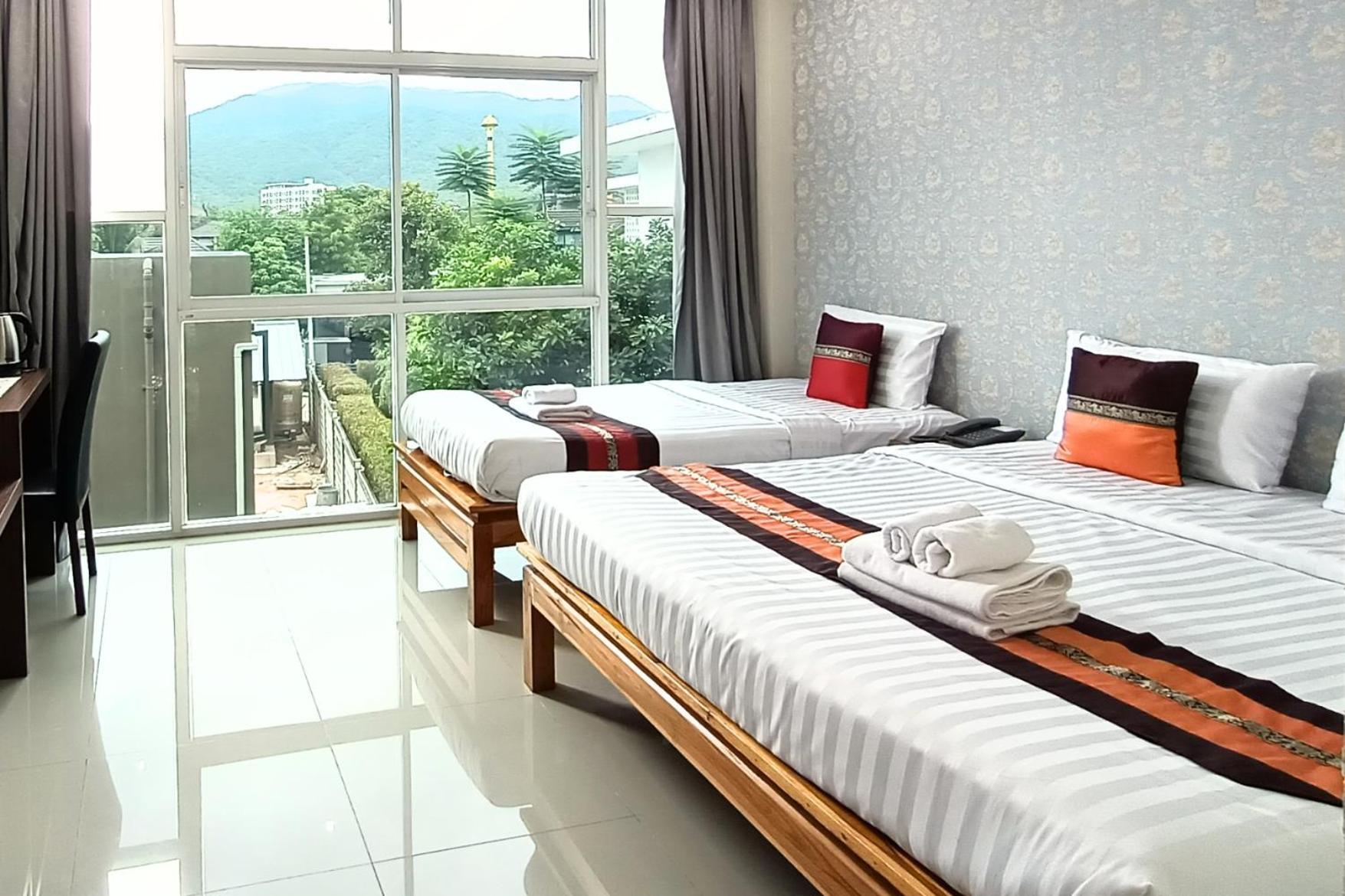 Km Hotel Chiang Mai Bagian luar foto