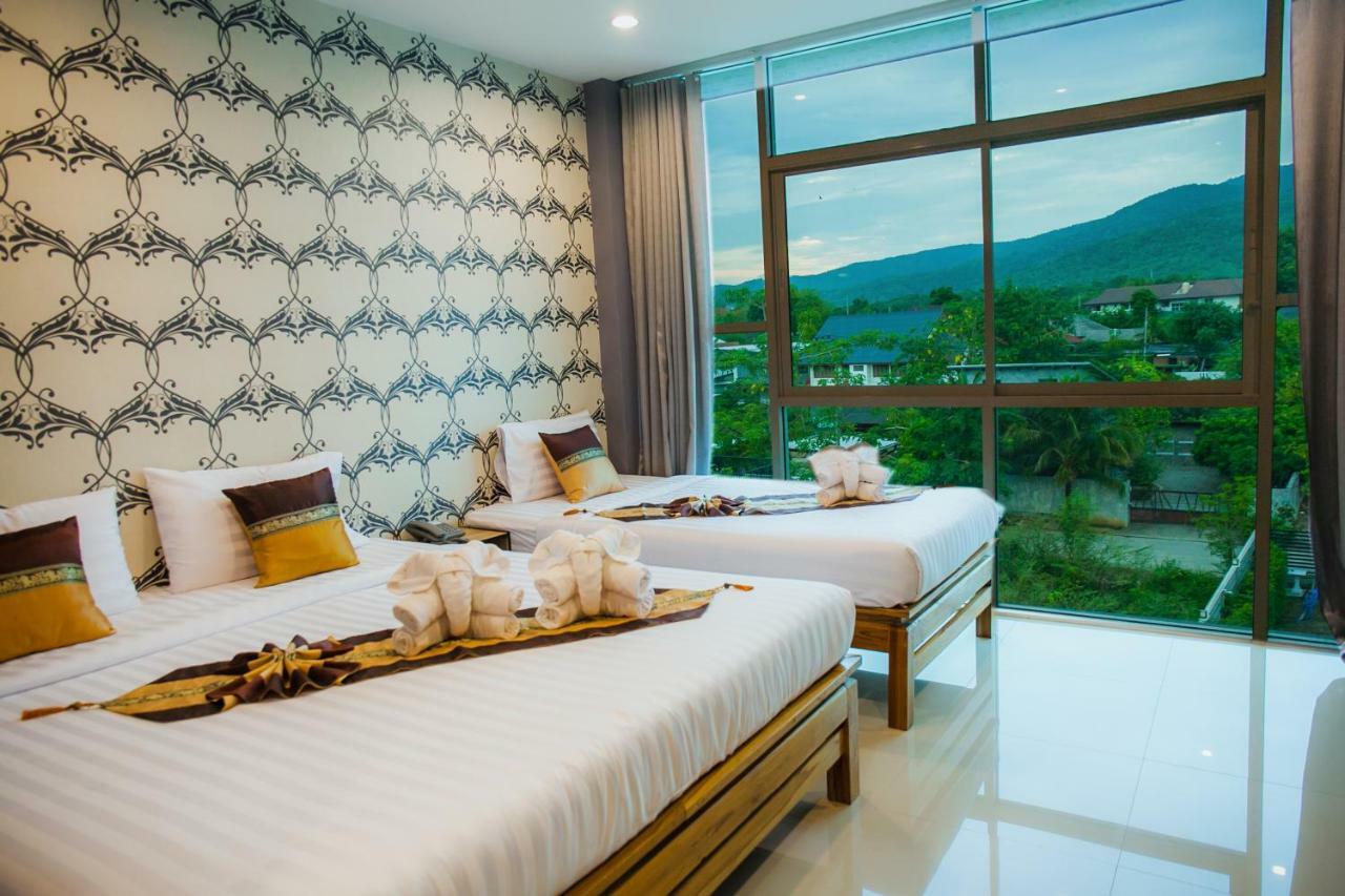 Km Hotel Chiang Mai Bagian luar foto